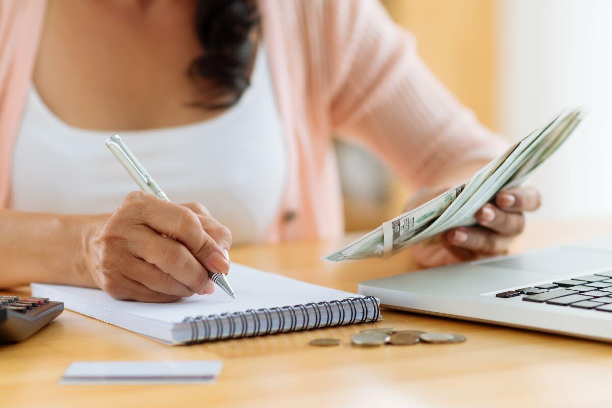 A picture of a woman reviewing her budget.