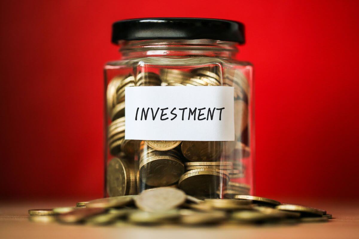 A picture of a jar with investment money.