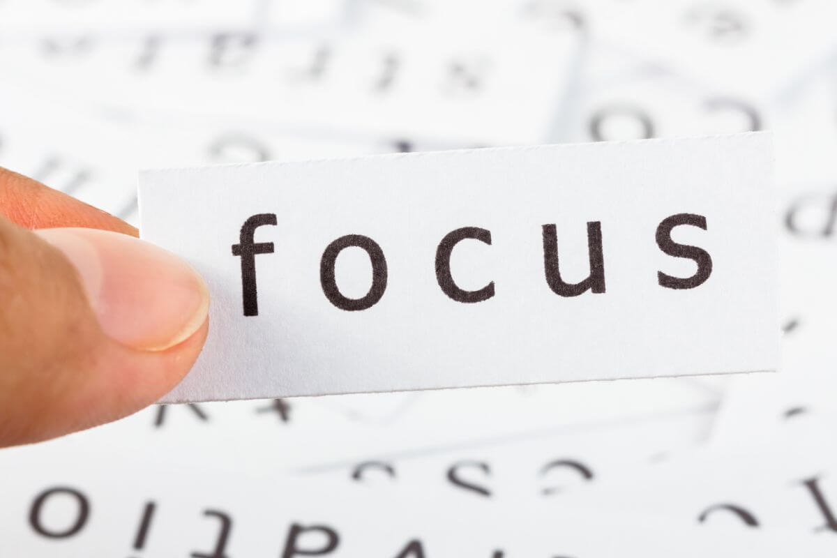 An image shows a paper with focus wording.
