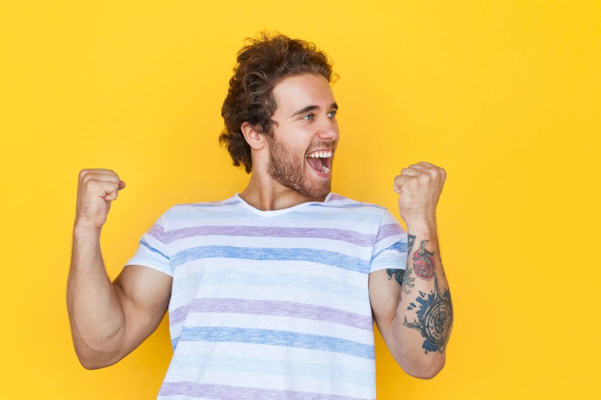 A picture shows a cheerful man.