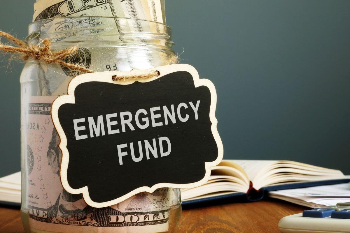 An image shows a jar with an emergency fund.