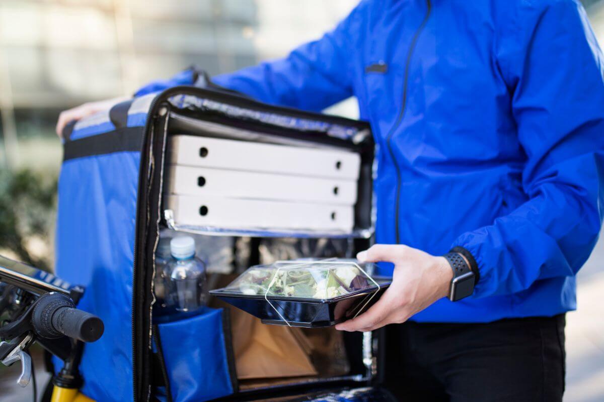 A picture of a food deliveryman.