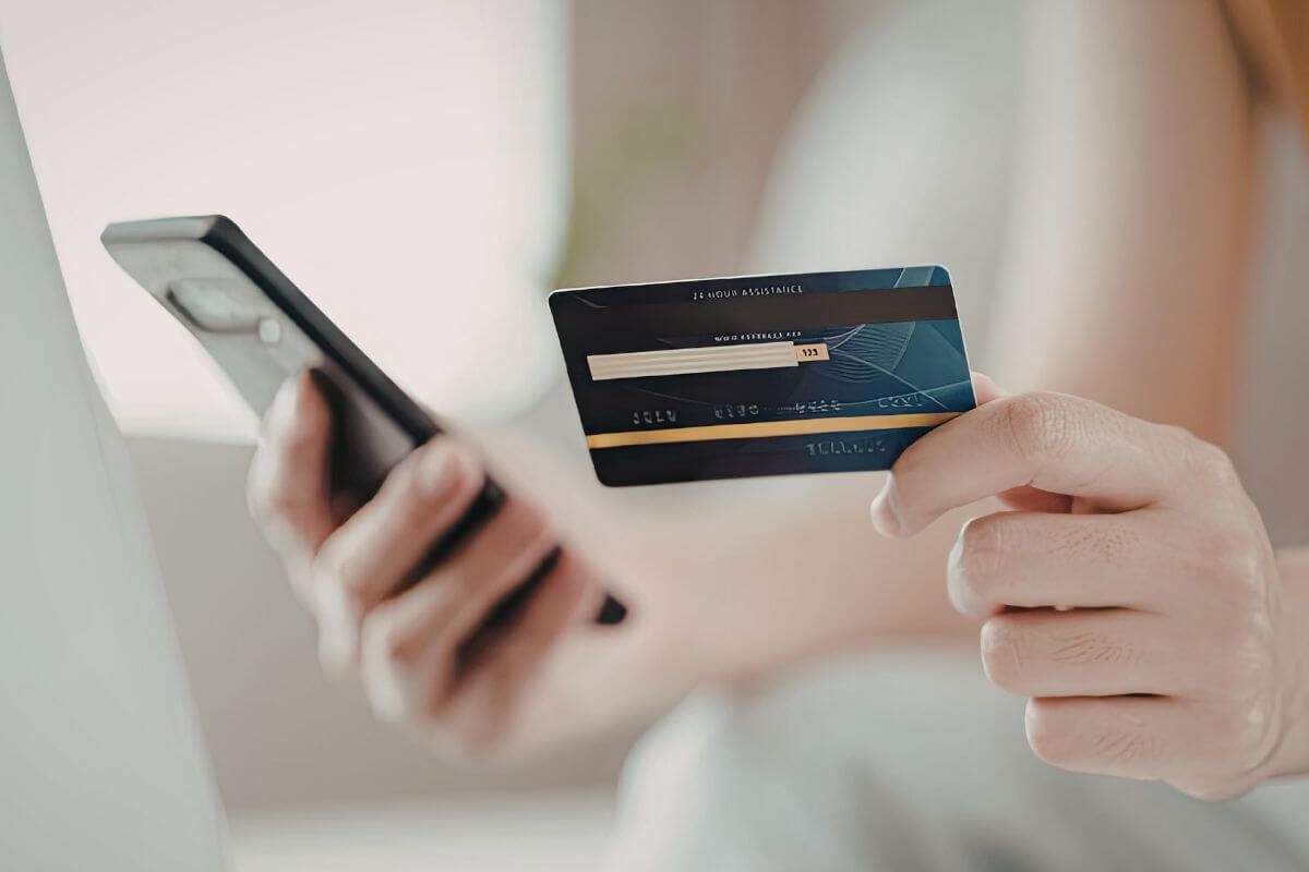 An image of a man paying online.