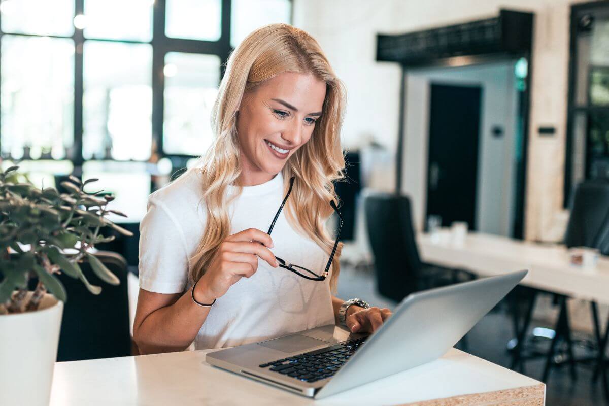 An image of a woman using a laptop.