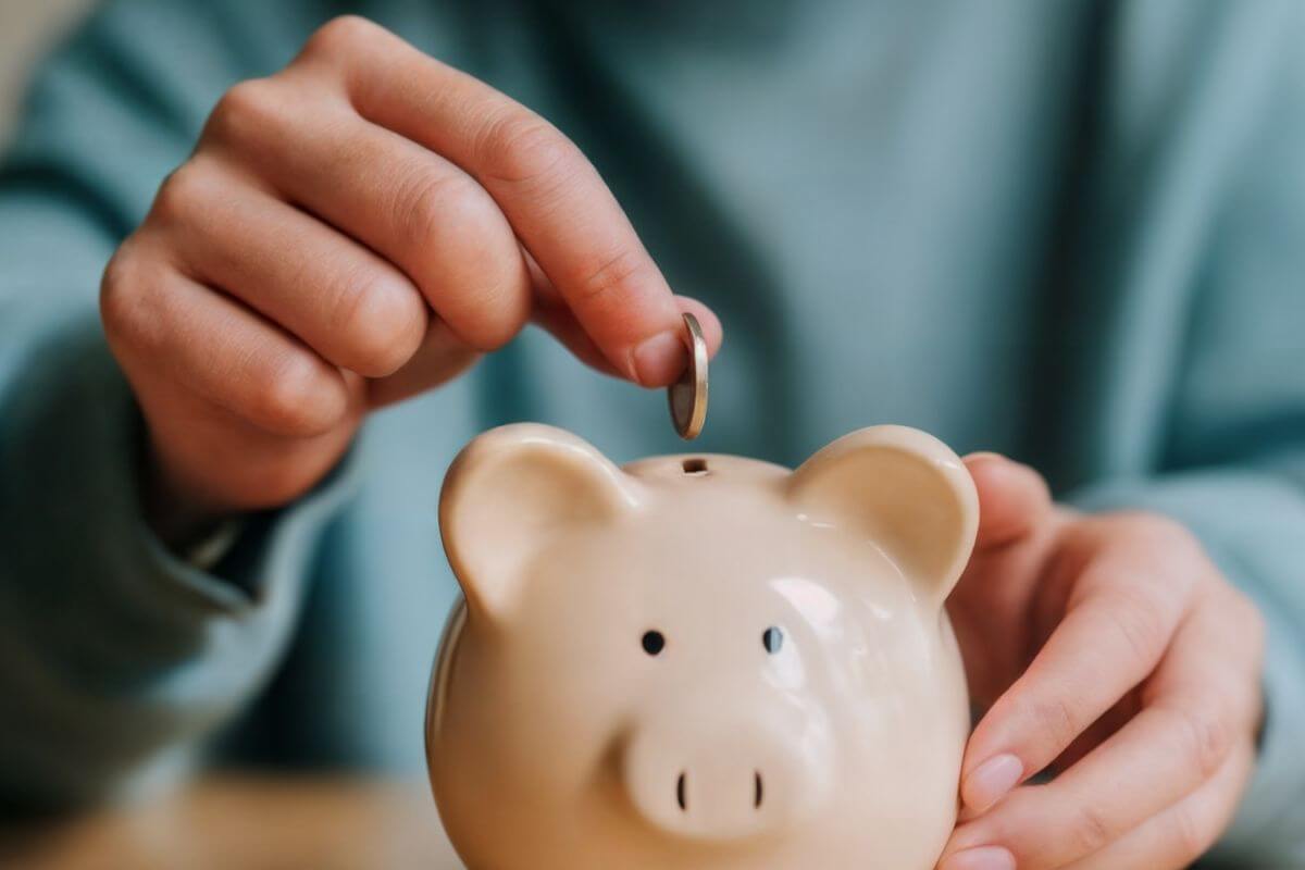 A picture of a man saving money.