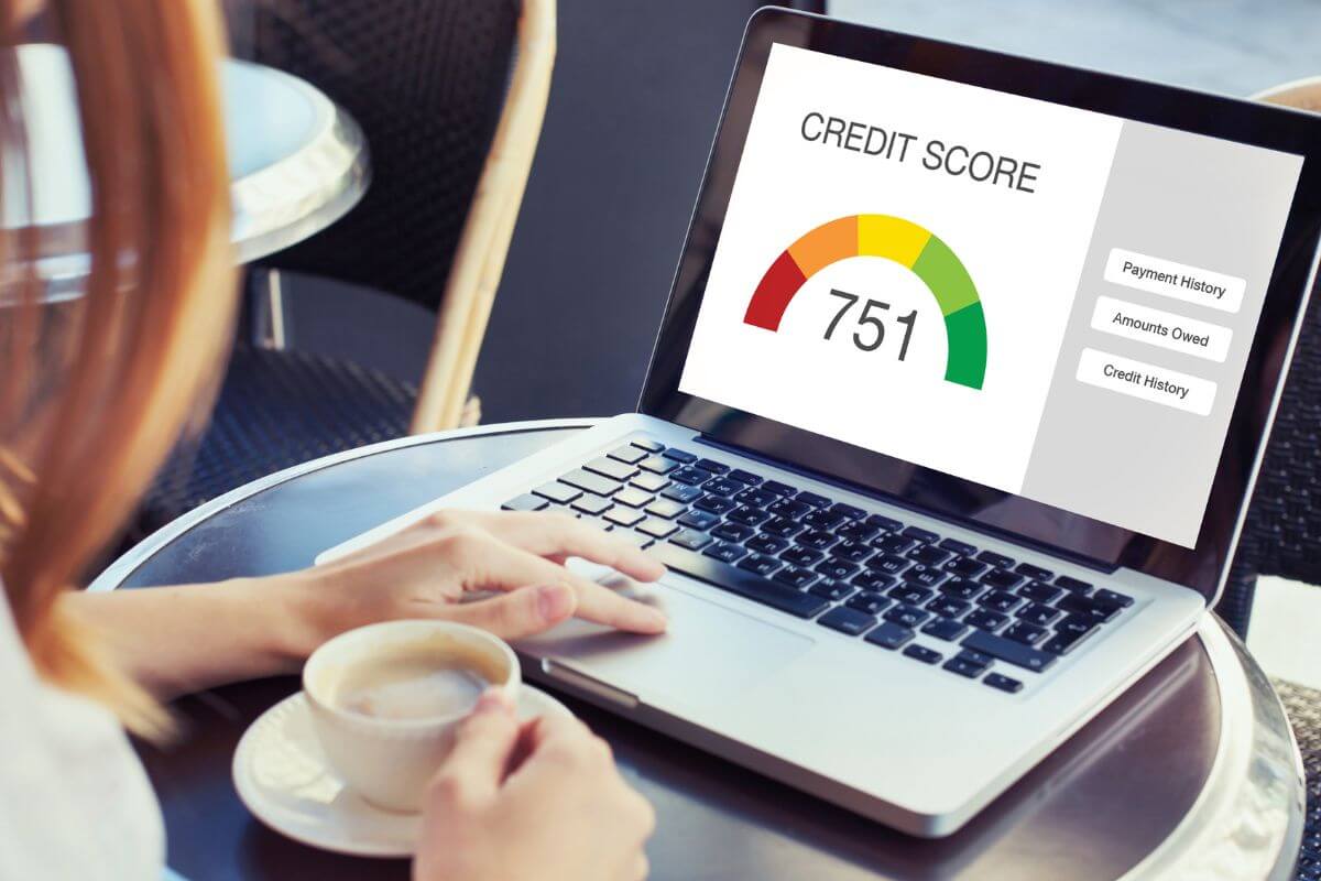 A picture of a woman checking her credit score.