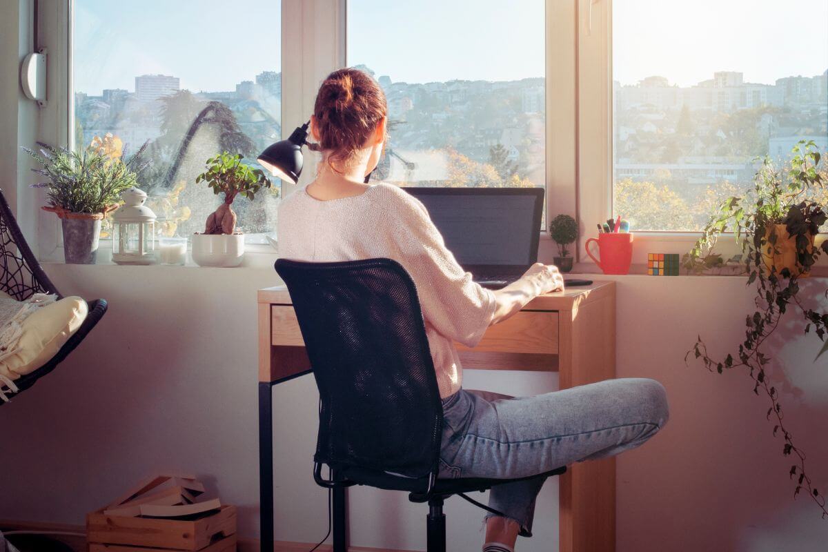 A picture of a woman working from home.