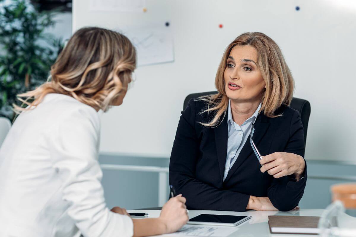 A picture shows a financial advisor talking to her client.