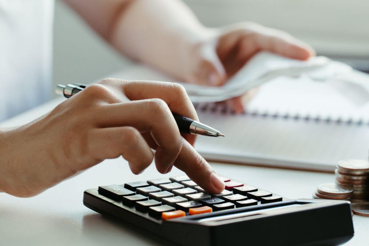 One photo shows a woman calculating her expenses.