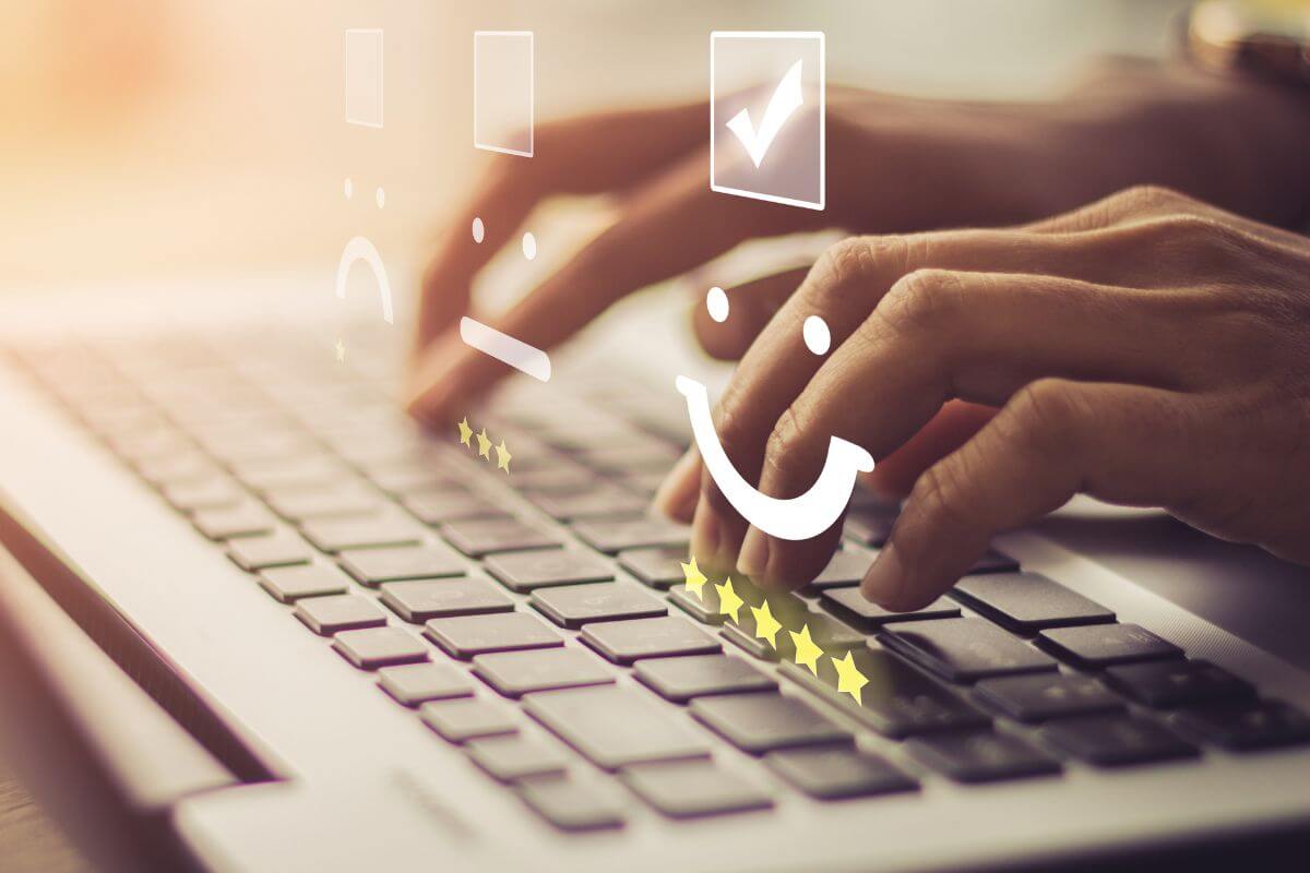 A picture shows a woman's hand reviewing something online.