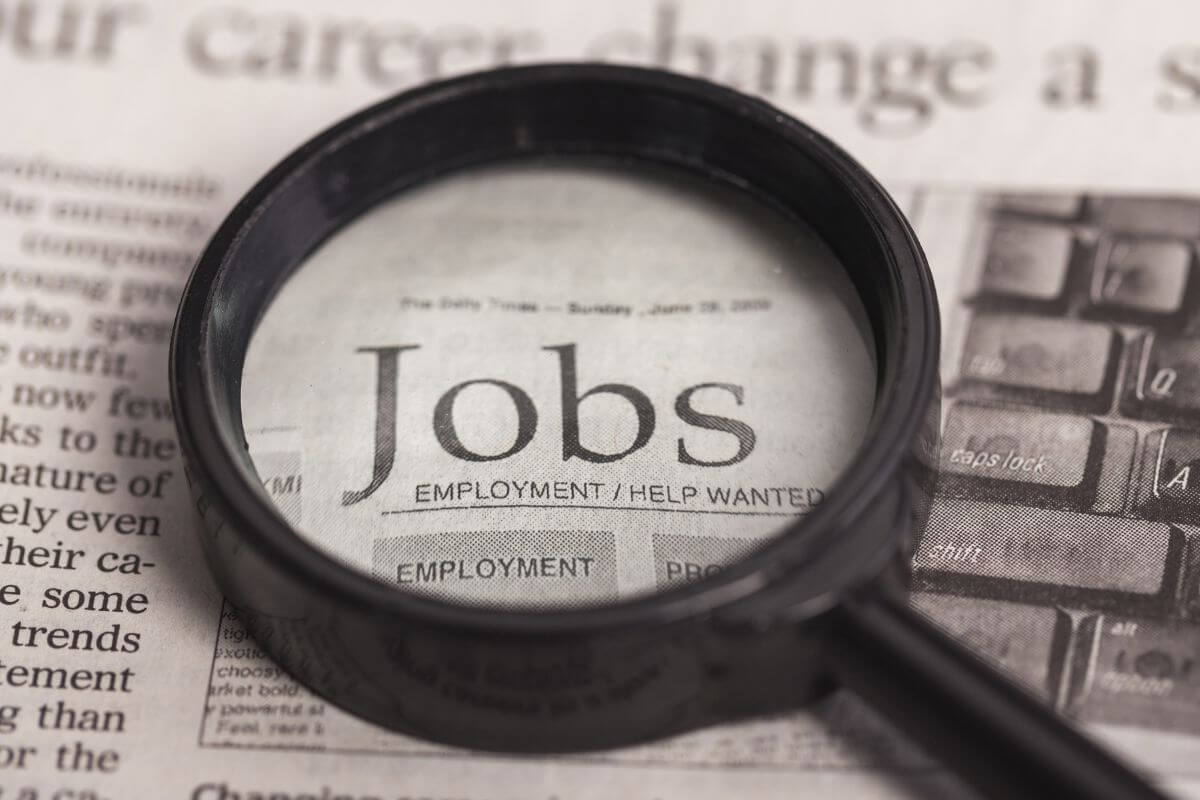 A picture shows a magnified Jobs wording.