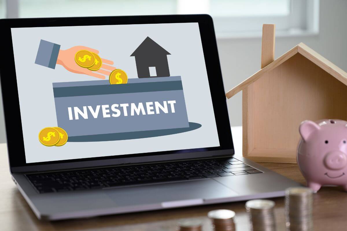 A picture of a laptop with an investment display.