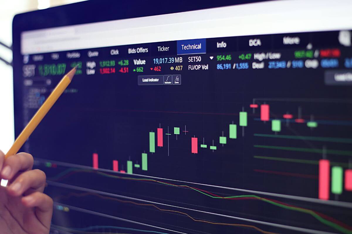 A picture shows a stock market graph on screen.