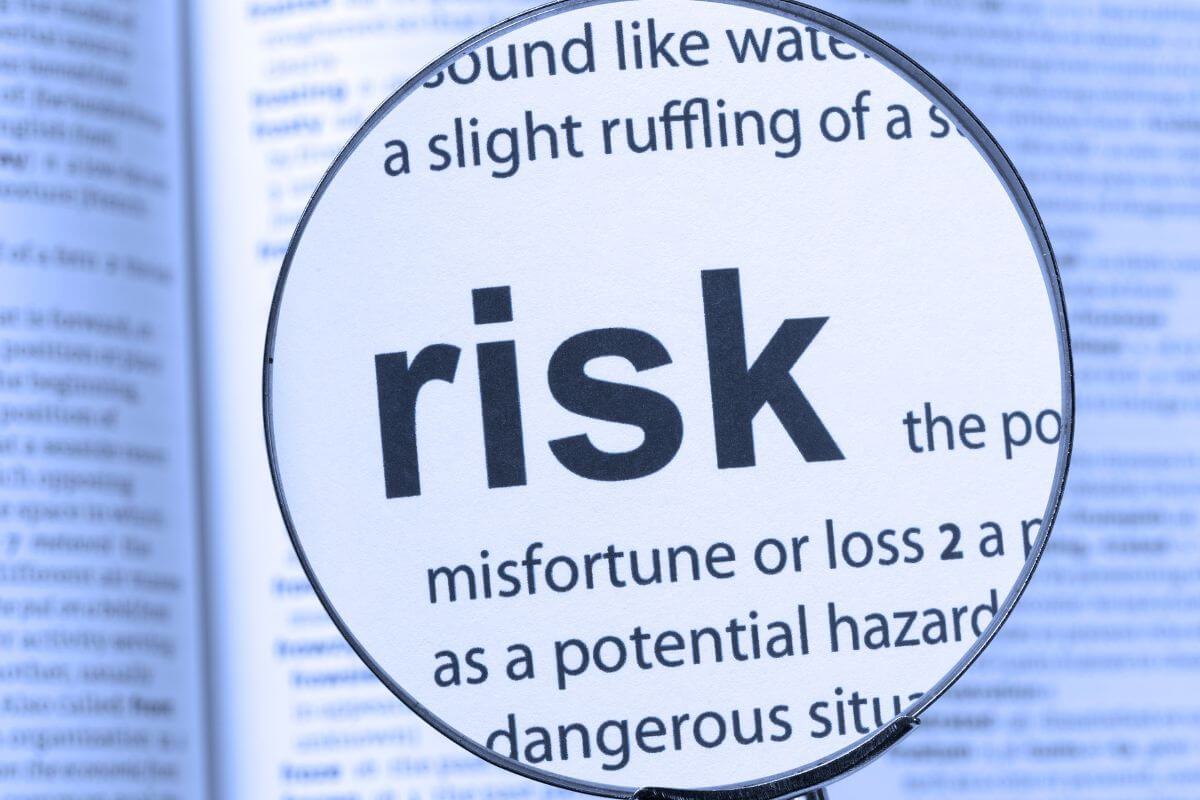 An image shows a magnified risk wording.