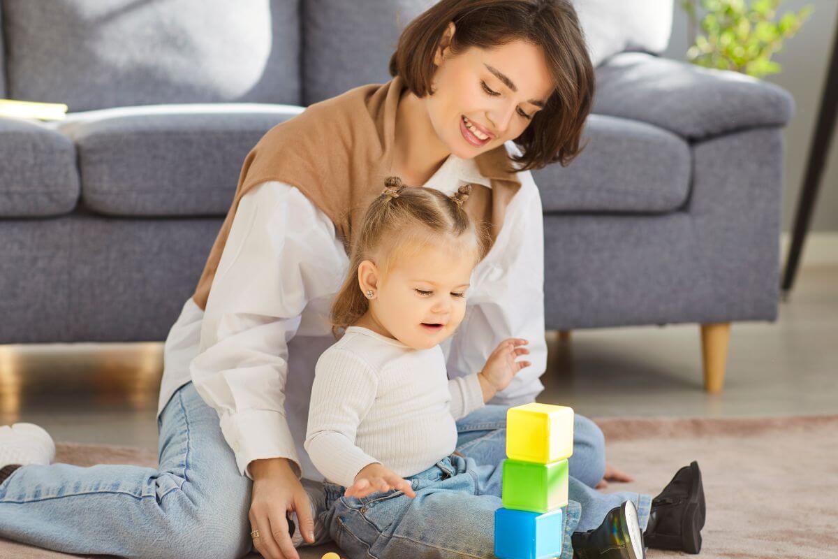 A picture shows a woman looking after the baby.