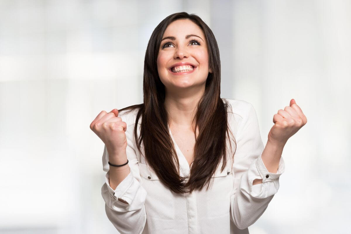 A picture shows a happy woman.