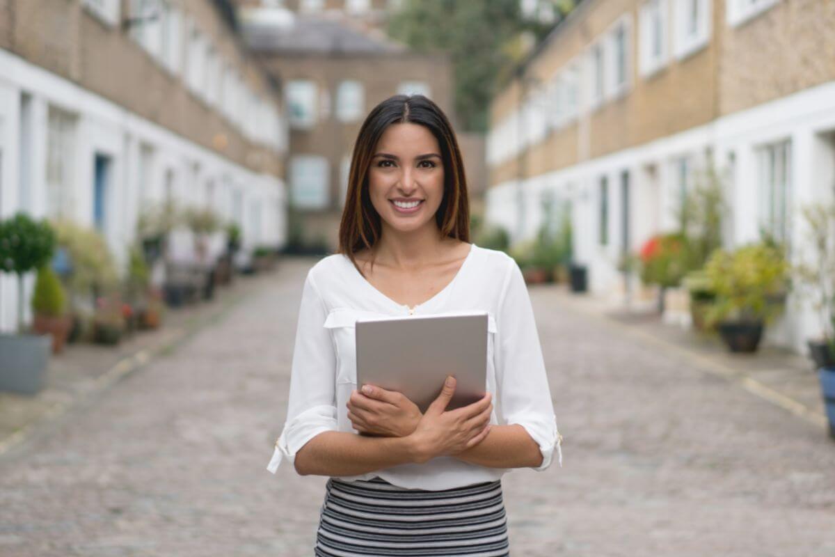 An image of a woman working as a real estate agent.