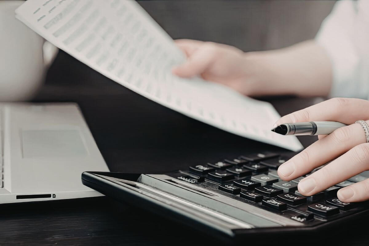 A photo shows a woman looking at the document.