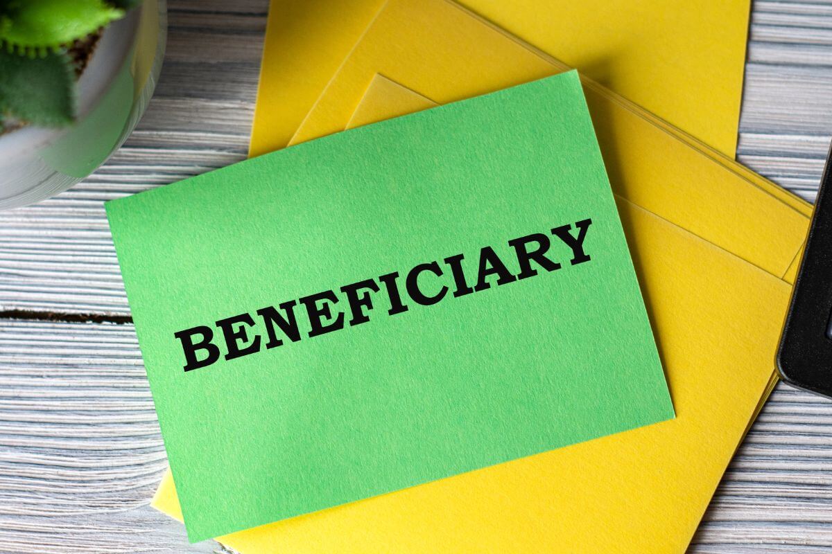 An image shows a paper with beneficiary wording.