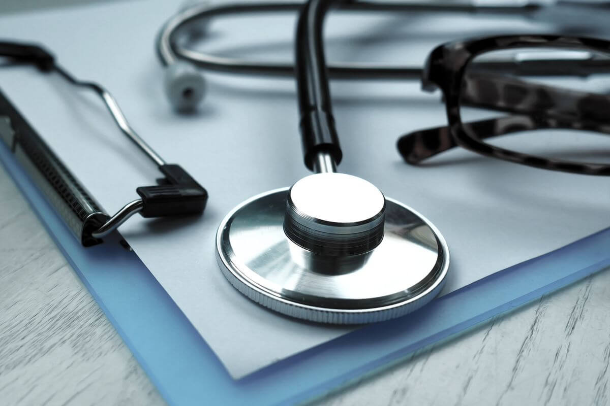 A picture shows a stethoscope and a document.
