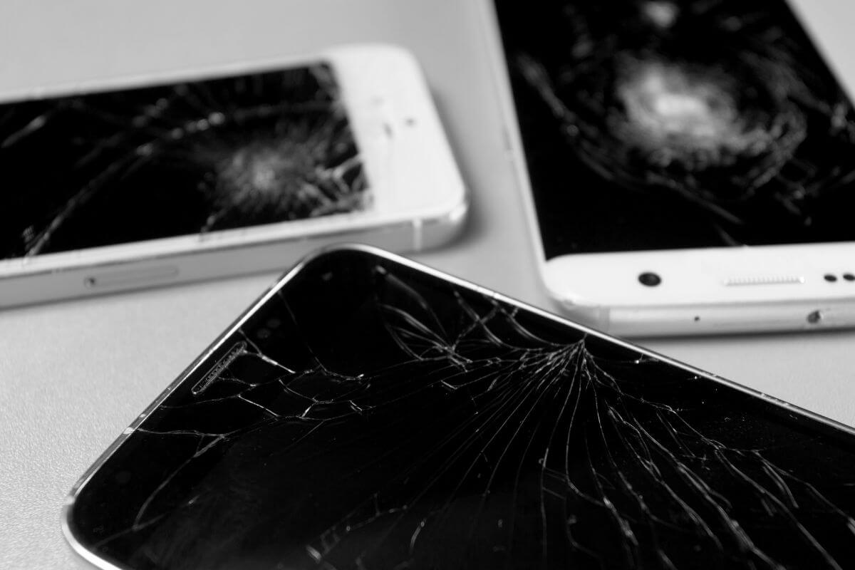 An image shows broken gadgets on the table.
